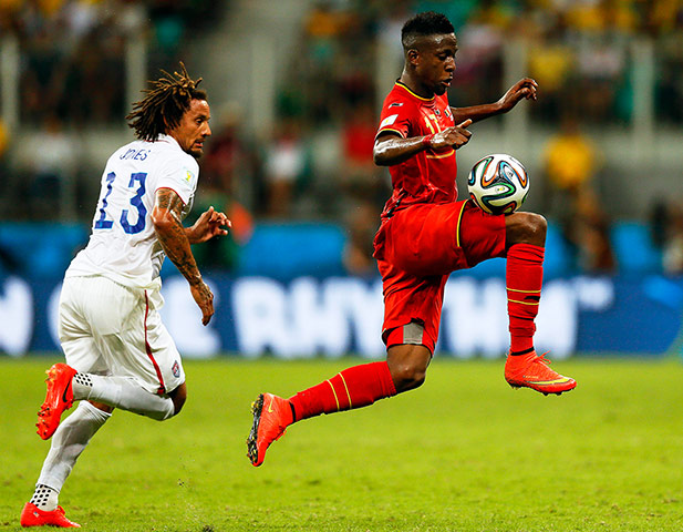belgium v usa: Divock Origi gallops away from Jermaine Jones