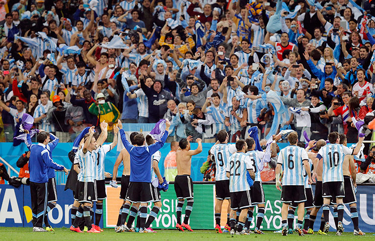 world cup semifinal: Argentina players celebrate the win with their fans