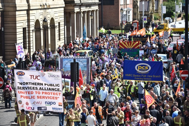 Public sector workers march through Newcastle city centre as they take part in the one-day walkout as part of bitter disputes over pay, pensions, jobs and spending cuts.