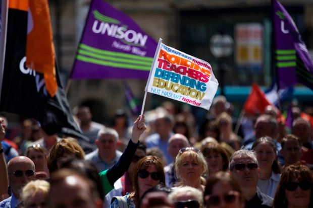 TUC members at a strike rally outside St George's Hall in Liverpool, as one million public sector workers are expected to walk out in protest at public sector pay, pensions and working conditions.