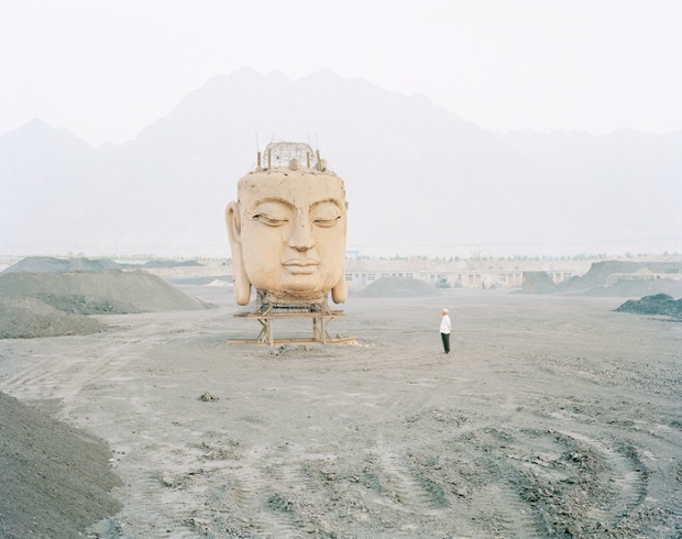 Kechun Zhang, Buddha in Coal Yard, Ningxia Province, 2011.
