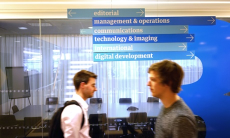 Guardian employees (Harry Slater and Daan Louter) make their way around the third floor of Kings Place.