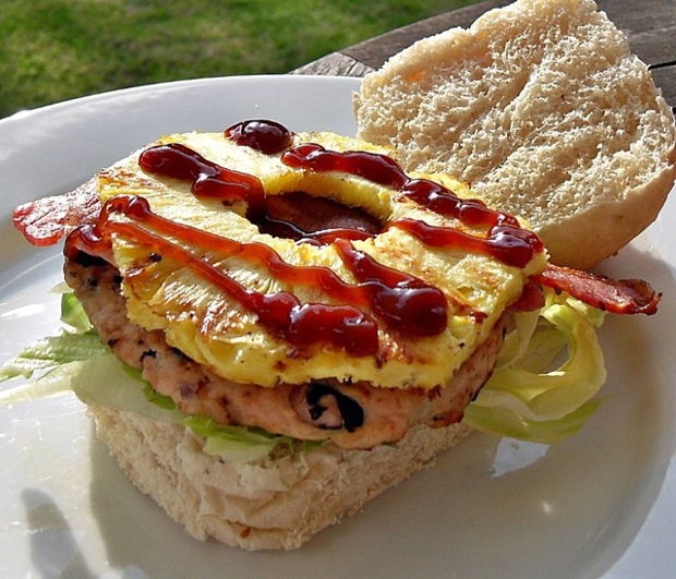 Turkey burgers with black turtle beans, smoked paprka, chillies and more - topped with bacon and barbecued pineapple!