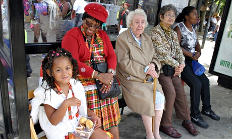 People sitting at bus stop