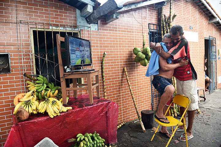 World Cup fans: TOPSHOTS  Fans of Brazil celebrate at th