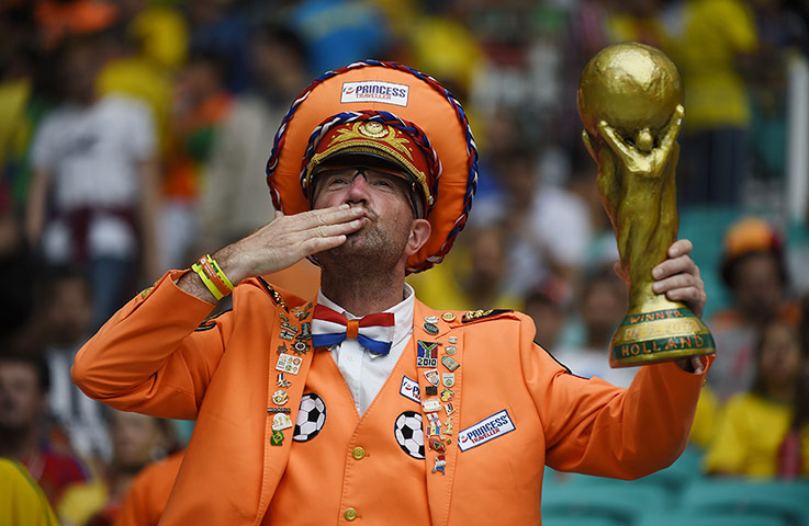 World Cup fans: TOPSHOTS  A Netherlands' fan holds a rep