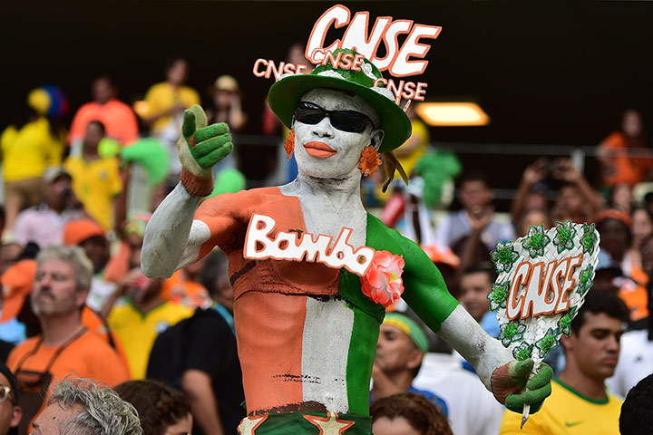 World Cup fans: TOPSHOTS  Ivory Coast's fans cheer befor
