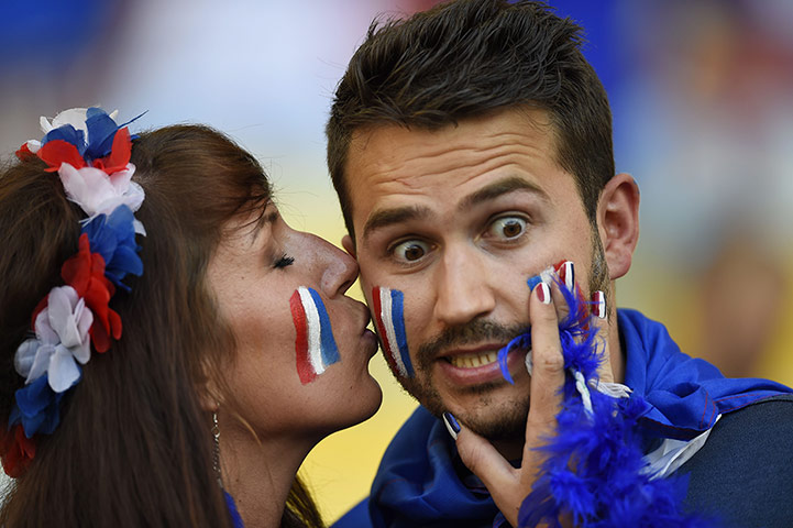 World Cup fans: TOPSHOTS  French supporters kiss prior t