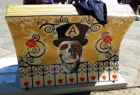 Here's the back of the bench that represents Ian Fleming's James Bond stories, painted by Freyja Dean