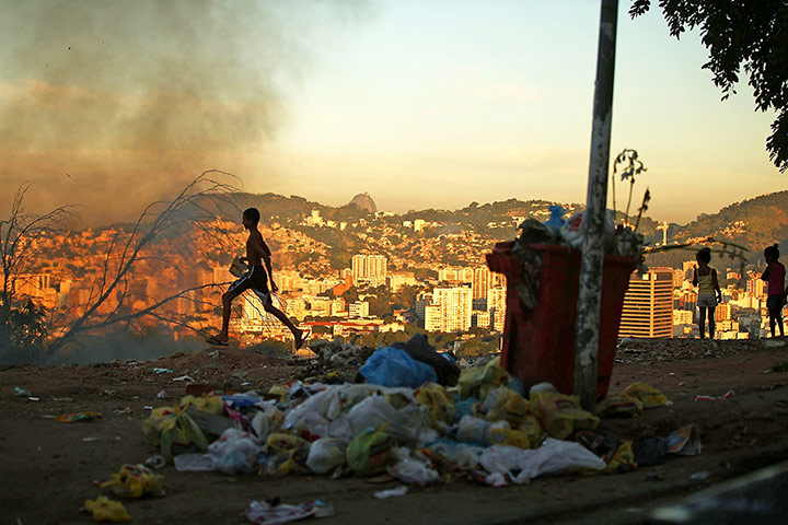 20 Photos: Rio Favela Overlooks Maracana World Cup Stadium