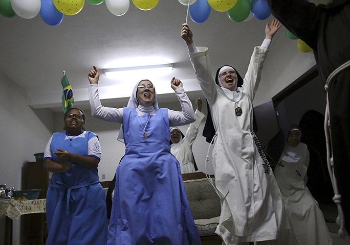 20 Photos: Nuns from Imaculada Conceicao celebrate Brazil's win in the quarter-final