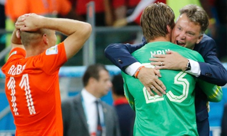 Louis van Gaal embraces Holland penalty expert Tim Krul.