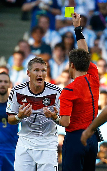 Schweinsteigar's Final: Germany's Schweinsteiger reacts as he is shown the yellow card 