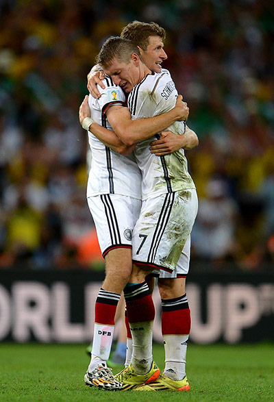 Schweinsteigar's Final:  Schweinsteiger hugs Thomas Mueller