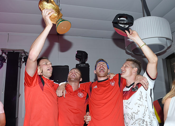 Schweinsteigar's Final: Germany team celebrate with the trophy