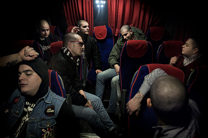 Weekend - Skinheads : skinheads sitting down on a journey to a concert in Italy
