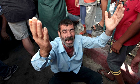 A relative of the four Palestinian children killed by a shell fired by an Israeli naval gunboat.