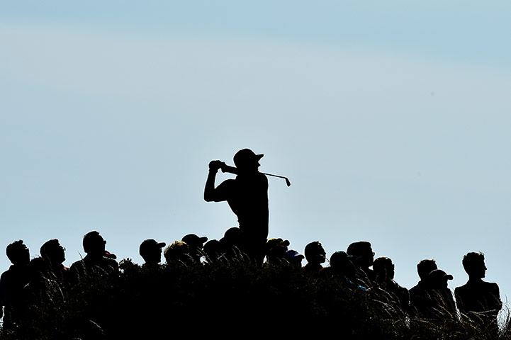 open golf day 1: Justin Rose hits his tee shot on the 12th 
