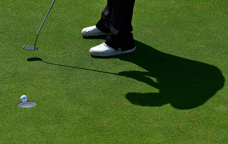 open golf day 1: Dong-Kyu Jang putts on the 15th