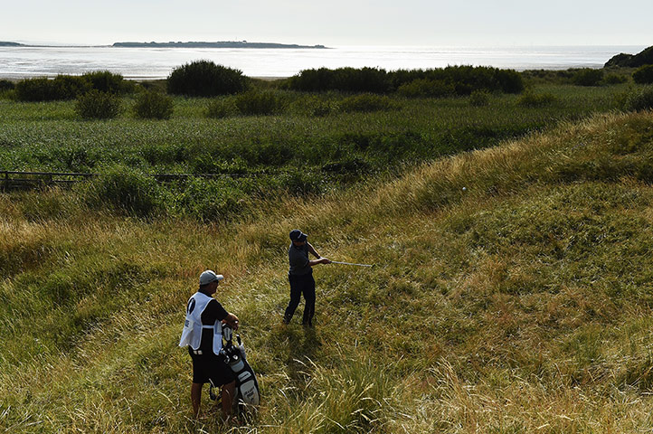 open golf day 1: Justin Rose hits his third shot on the 14th
