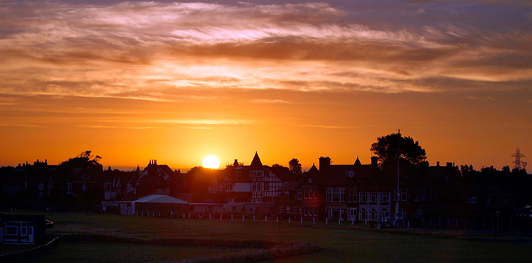 open golf day 1: The sun rises over the clubhouse