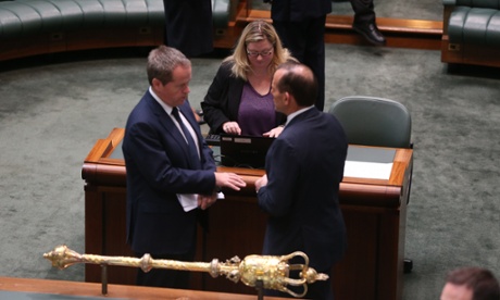 Tony Abbott talks to the opposition leader, Bill Shorten, in the House of Representatives on Friday morning.
