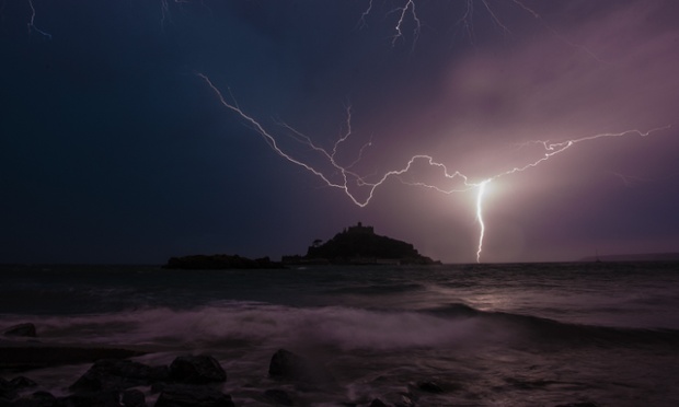 Did the storm wake you up last night? Lightning strikes over the tidal island of St Michael's Mount in Cornwall during a summer thunderstorm.