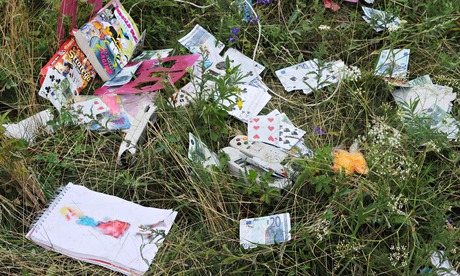 Passengers' belongings at the site of the Malaysia Airlines plane crash in east Ukraine