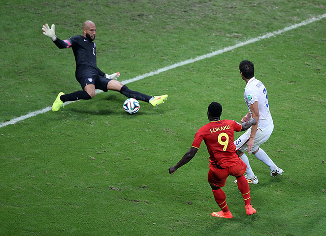 tim howard:  Goalkeeper Tim Howard saves