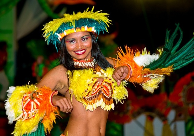 'Boi Bumba, Parintins, Amazona. Two teams, the Reds and the Blues, compete annually to see who can produce the best music, dance and visual spectacle. It's origins lie in tribal warfare, but are now part of the cutural heritage of this area.'