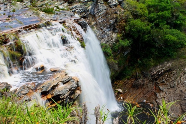 'Bicame's waterfall, Serra do Cipó, Minas Gerais, Brazil. The breathtaking cold waters of Bicame, a huge waterfall located inside a private natural park beside Serra do Cipó, one of most beautiful national park in Brazil. The photo has been taken at the raining season, when there's a lot of water flowing.'