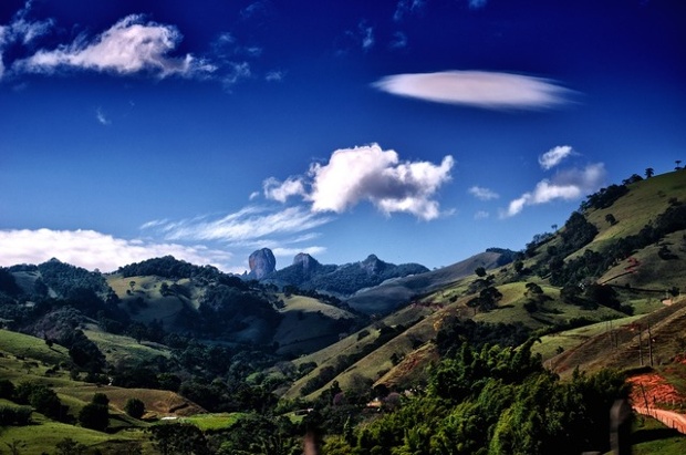 'Pedra do Bau. Granite outcrop in the state of São Paulo, close to its border with the state of Minas Gerais in the Mantiqueira mountains, with peaks here of around 2000m with an almost alpine feel at higher levels. The surrounding countryside, which is something like a sub-tropical North Wales with its rolling hills and peaks, contains a number of small pleasant towns such as São Bento do Sapucai and Gonçalves.'