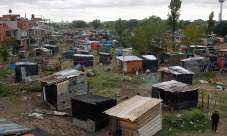 Makeshift shelters are scattered all over the ‘Pope Francis’ squatter settlement in Villa Lugano. Photograph: Reuters