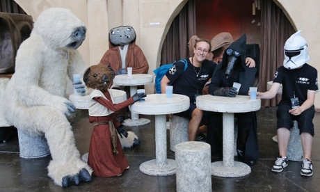 Actors in costumes with visitors at the Star Wars Celebration festival in Essen, Germany.