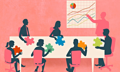 Business people with multicolored jigsaw 