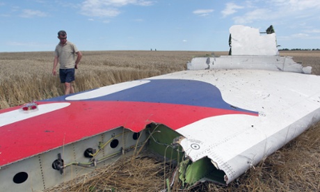 mh17 crash site airlines graphic debris malaysia flight ukraine social inspects main man hoax movie why dead plane did many