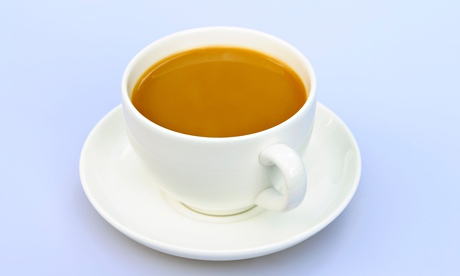 Cup of tea in a plain white cup & saucer