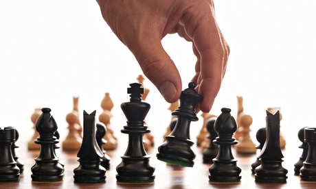 Chess board and hand.