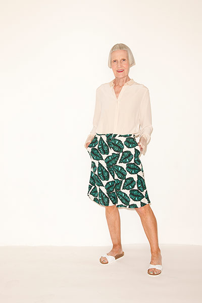 fashion wish list: white shirt green patterned short white pool slider shoes