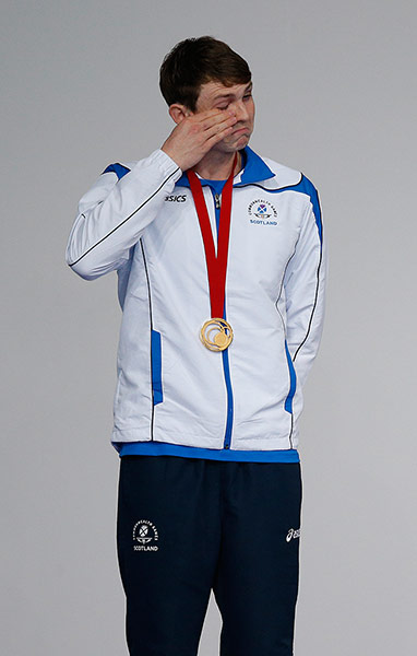 Tom Jenkins day one: Ross Murdoch cries on the podium