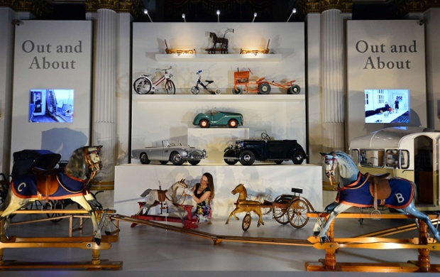 A member of staff works on a rocking horse and polo mallet given to Prince George by Barack Obama