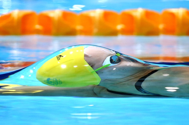 Belinda Hocking of Australia competes in the Women's 100m Backstroke Heat 2 at Tollcross International Swimming Centre during day two of the Glasgow 2014 Commonwealth Games in Glasgow, Scotland.