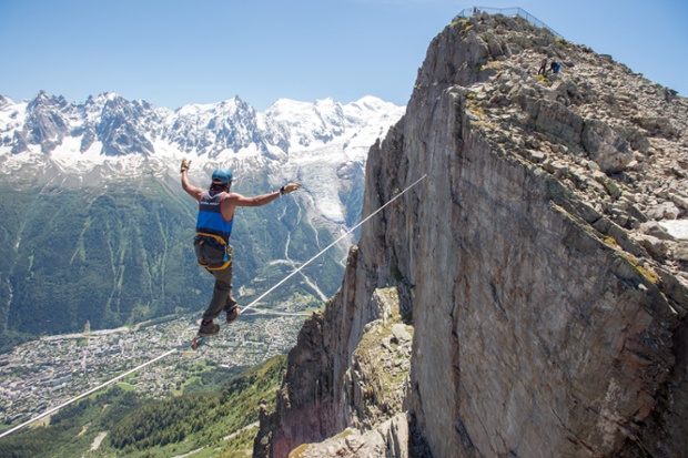 Jos Pablo Donoso on the highline 150m above ground in Chamonix, France.