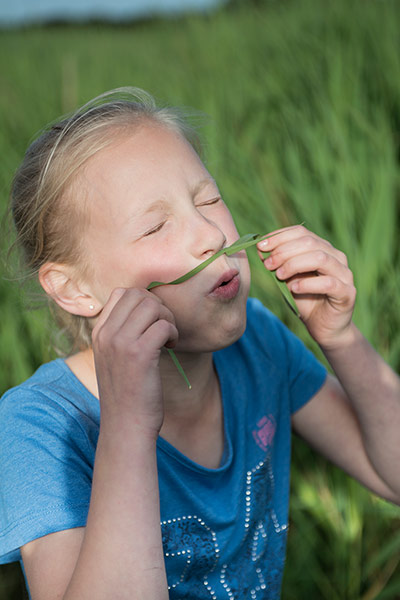 National Trust Hawthorne: National Trust: Amy Hawthorne blows a grass trumpet