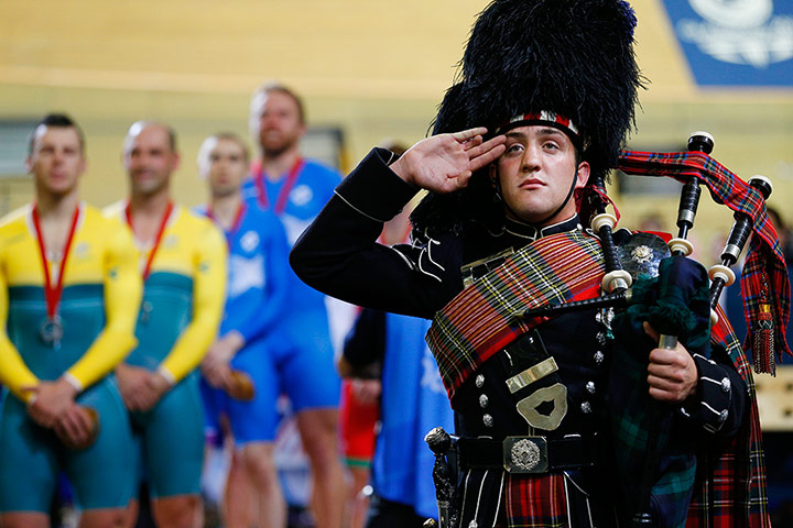 tom jenkins day 2: A piper salutes the Scottish flag