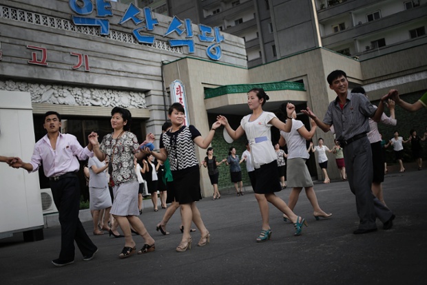 Pyongyang, North Korean: People gather for a dance as North Korea celebrated its 61st anniversary of the armistice that ended the Korean War.