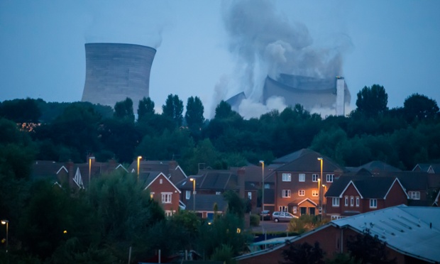 Didcot, UK: Didcot Power Station towers in the process of being demolished at 5am.