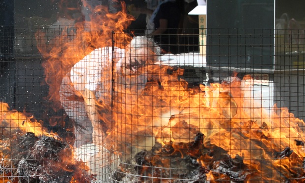 Taipei, Taiwan: A Taiwanese man burns 