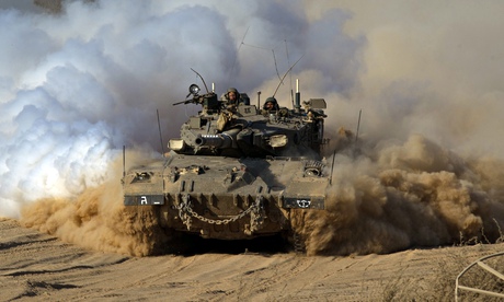 An Israeli tank heads towards Gaza