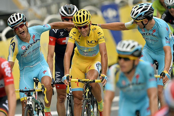 Best TDF 2014: Winner Italy's Vincenzo Nibali is congratulated by his Astana's teammates